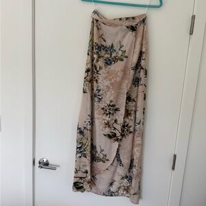 Set top and skirt has attached underwear, beige floral green size small